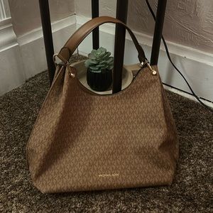 Medium Size Brown Michael Kors Purse. “MK” Pattern. Brand New with Tags